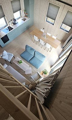 Moderner, skandinavischer Wohnraum auf Hitra, Norwegen: Helle Küche, Esstisch für sechs Personen, gemütliche Sofaecke. Idealer Ausgangspunkt für Angelreisen. Skandinavisches Design trifft auf Komfort und Funktionalität, perfekt für Erholung nach einem erlebnisreichen Angeltag.